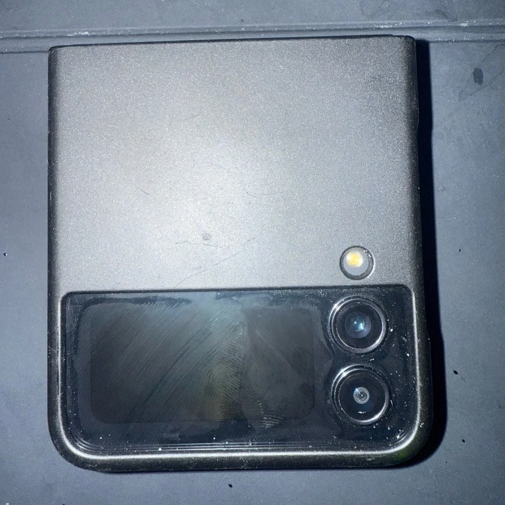 Black Foldable Smartphone with Blue Display